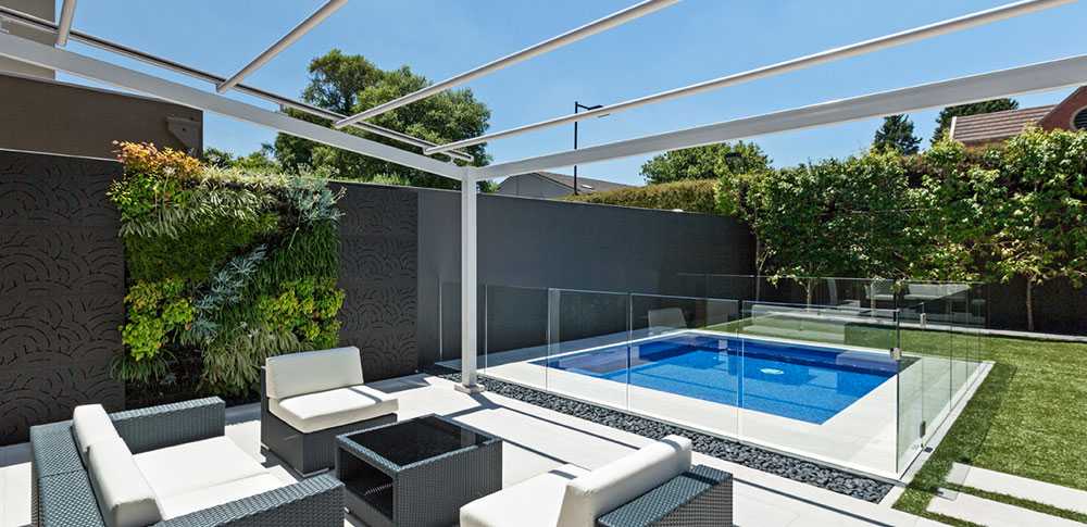 Outdoor pool with outdoor living room