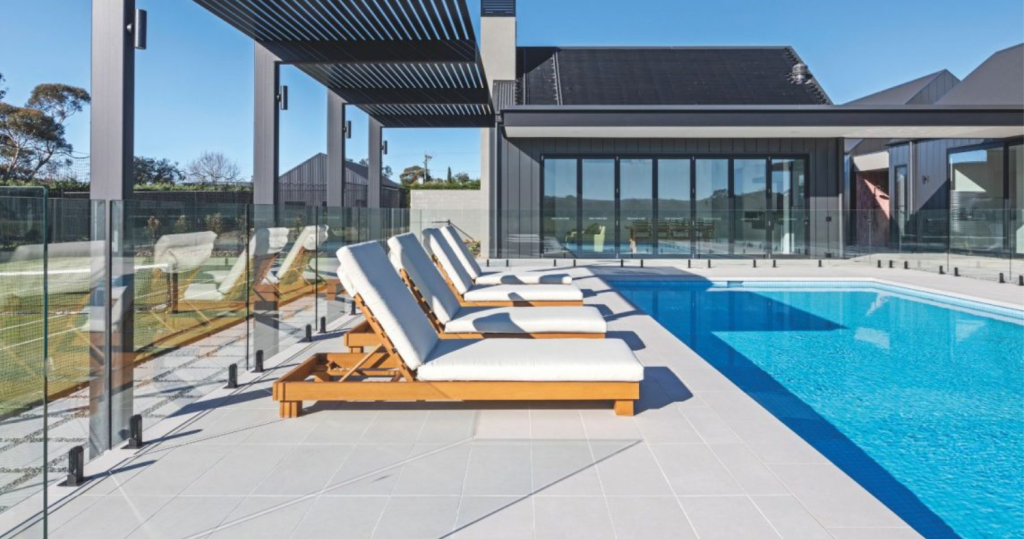 Oyster White Porcelain pavers poolside hero shot